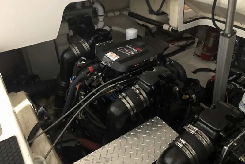 Slide: The Image of Engine compartment of a 2007 Regal 3350 Sport Cruiser, showcasing mechanical components. - 32