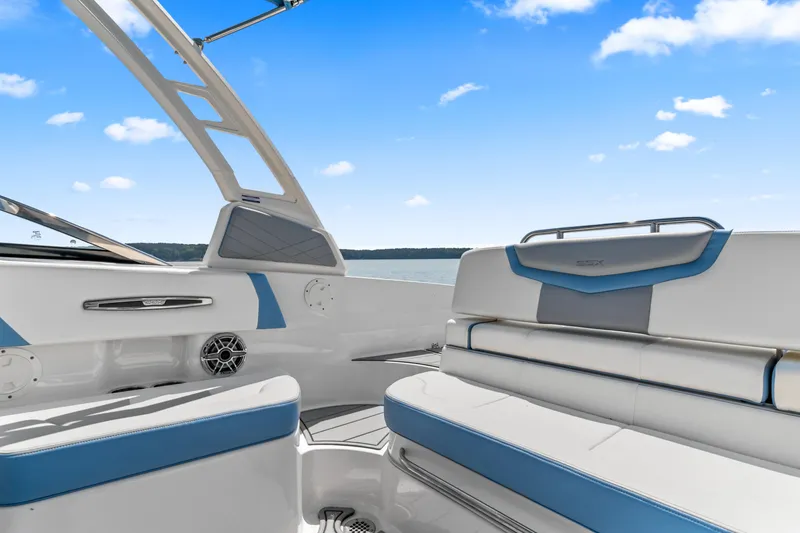 Slide: The Image of Interior of 2022 Chaparral 247 SSX boat with blue and white seating. - 17