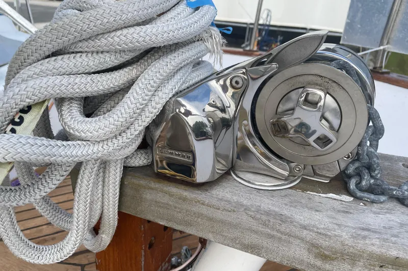 Slide: The Image of Rope and winch on 1981 Albin 36 Trawler deck, showcasing marine equipment. - 13