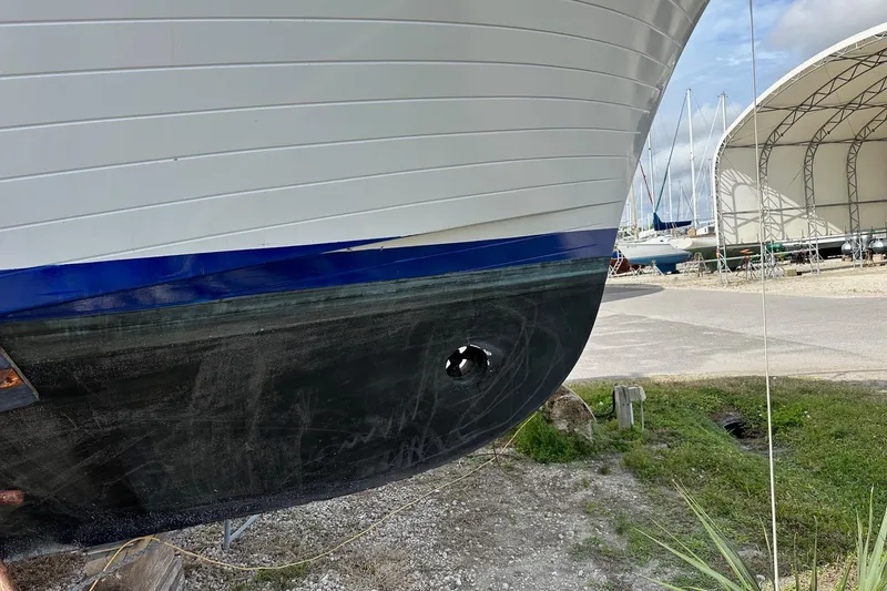 Slide: The Image of 1981 Albin 36 Trawler hull on dry dock, showcasing its sleek design and craftsmanship. - 30