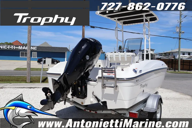 Slide: The Image of 2026 Bayliner Trophy T18 boat on trailer at Antonietti Marine dealership. - 10