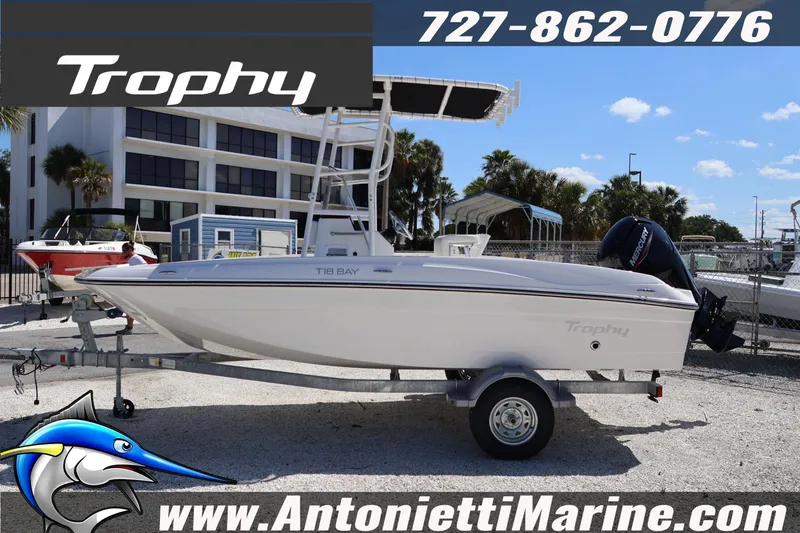 Slide: The Image of 2026 Bayliner Trophy T18 boat on trailer at Antonietti Marine dealership. - 12