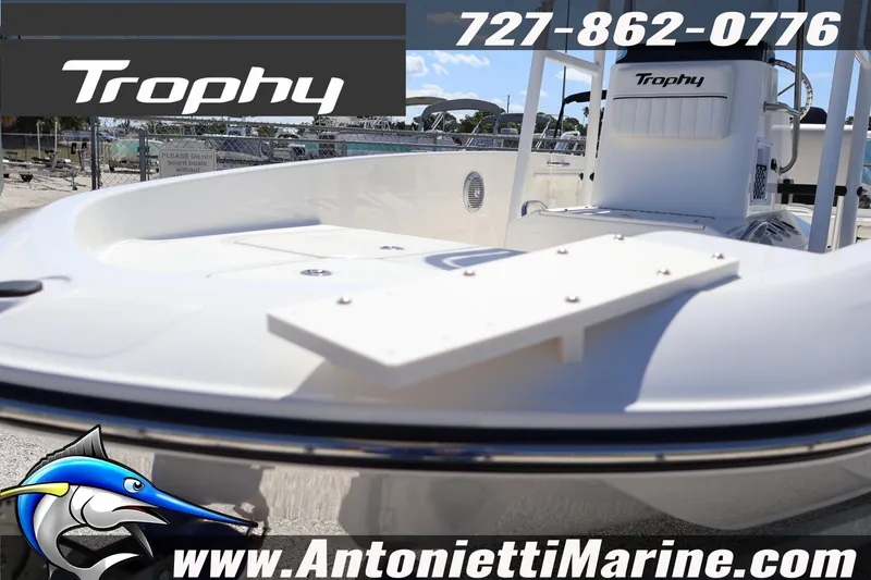 Slide: The Image of 2026 Bayliner Trophy T18 boat displayed at Antonietti Marine dealership. - 13
