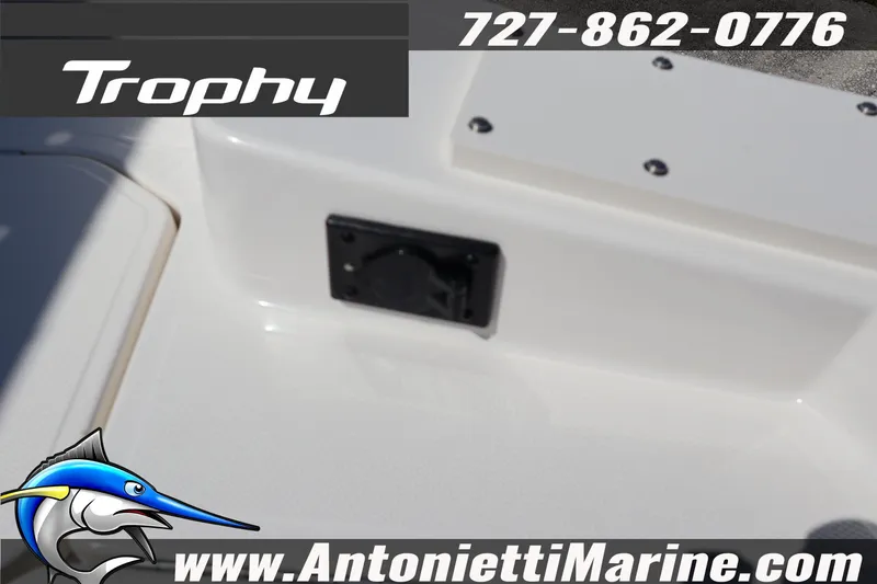 Slide: The Image of 2026 Bayliner Trophy T18 boat detail with contact information and logo. - 16
