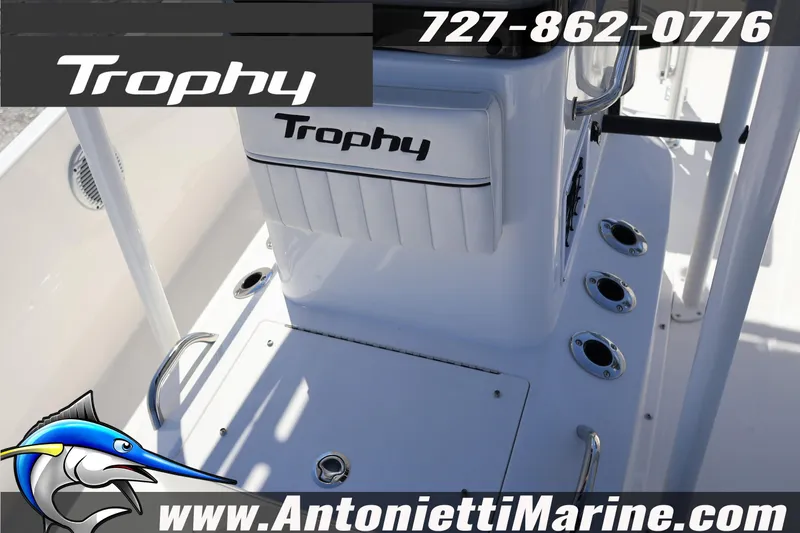 Slide: The Image of 2026 Bayliner Trophy T18 boat console with rod holders and branding details. - 25