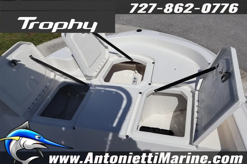 Slide: The Image of 2026 Bayliner Trophy T18 boat storage compartments open, showcasing spacious design. - 27