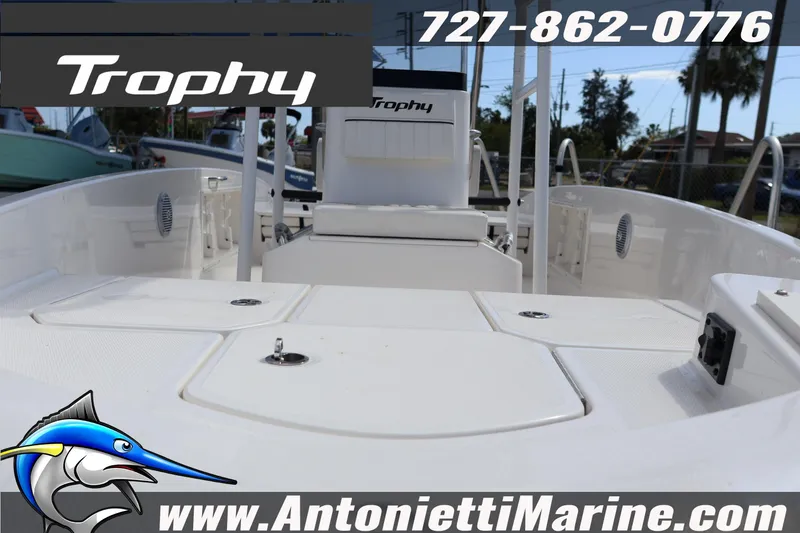 Slide: The Image of 2026 Bayliner Trophy T18 boat interior with seating and storage compartments. - 5