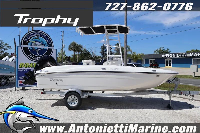 Slide: The Image of 2026 Bayliner Trophy T18 boat on trailer at Antonietti Marine dealership. - 8