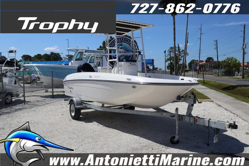 Slide: The Image of 2026 Bayliner Trophy T18 boat on trailer at Antonietti Marine dealership. - 9
