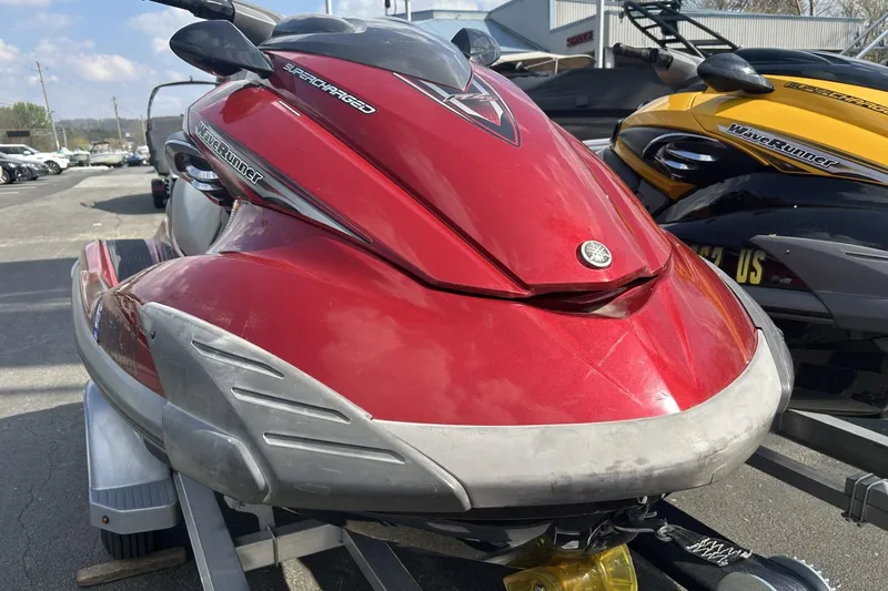 Slide: The Image of 2011 Yamaha WaveRunner FZS in red, parked on a trailer, side view. - 8