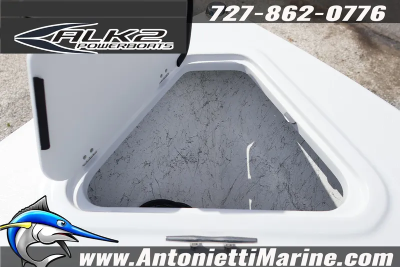Slide: The Image of 2026 ALK2 Powerboats 22 CRS storage compartment, featuring open hatch and textured interior. - 18
