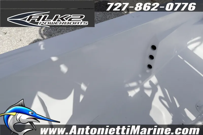 Slide: The Image of 2026 ALK2 Powerboats 22 CRS interior with branding and contact details. - 20