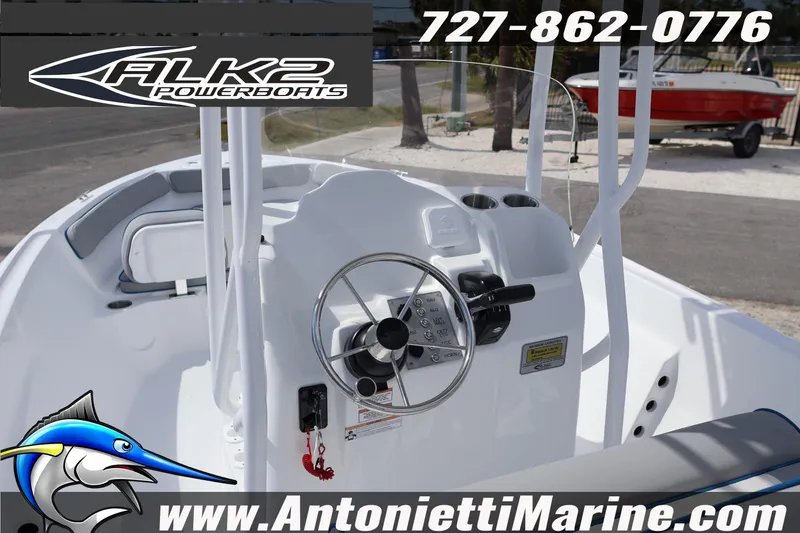 Slide: The Image of 2026 ALK2 Powerboats 22 CRS console with steering wheel and controls, displayed at Antonietti Marine. - 8