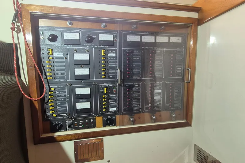 Slide: The Image of Electrical control panel on 1988 Custom Holland Wesmac-Foley Flybridge Cruiser. - 105