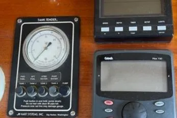 Slide: The Image of Instrument panel of a 1988 Holland Wesmac-Foley Flybridge Cruiser. - 18