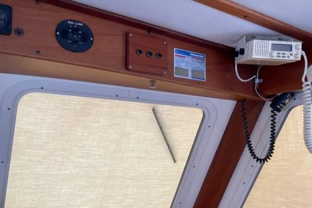 Slide: The Image of Interior of 1988 Holland Wesmac-Foley Flybridge Cruiser with radio equipment. - 23