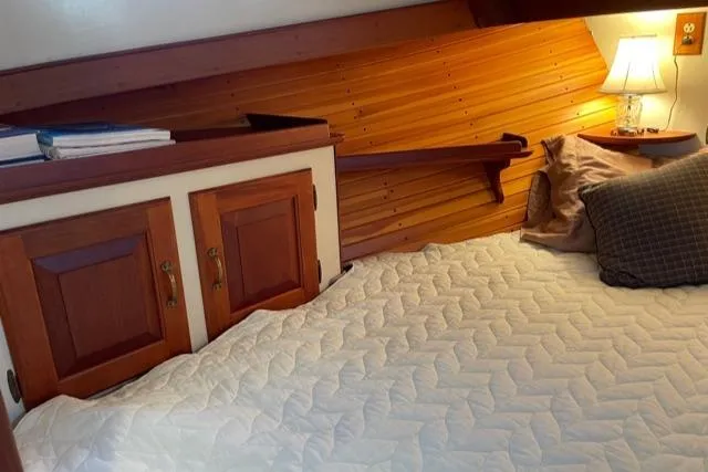 Slide: The Image of Cozy cabin in 1988 Holland Wesmac-Foley Flybridge Cruiser. - 41