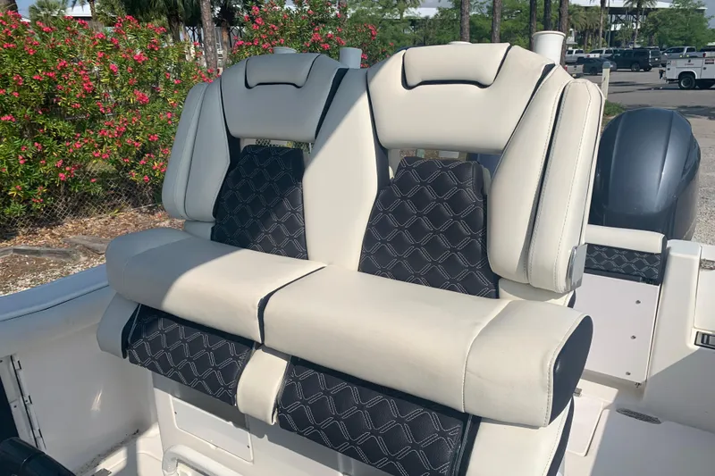 Slide: The Image of 2021 Tidewater 256 CC Adventure boat seats with stylish upholstery and comfortable design. - 13