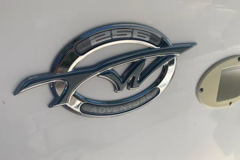 Slide: The Image of Tidewater 256 CC Adventure 2021 emblem on boat hull. - 9
