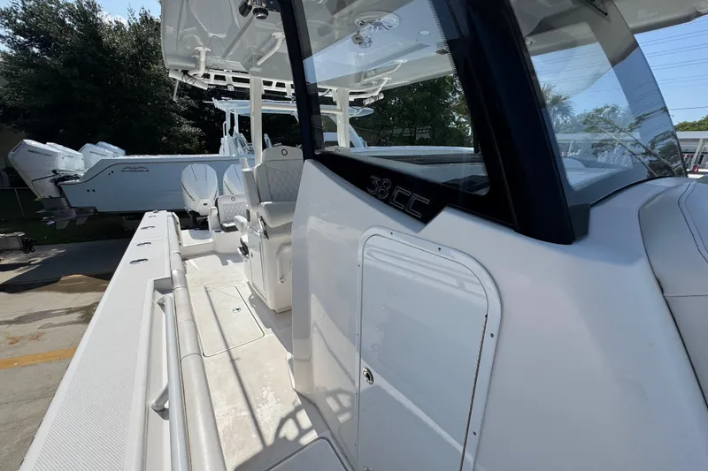 Slide: The Image of 2023 Fountain Bluewater 38 CC boat, showcasing sleek design and modern features. - 21