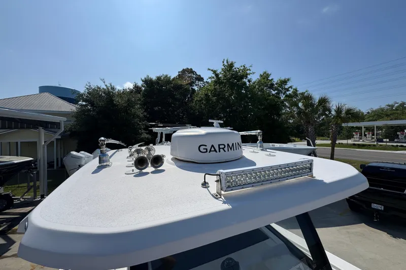 Slide: The Image of 2023 Fountain Bluewater 38 CC boat with Garmin radar and LED light bar on deck. - 22