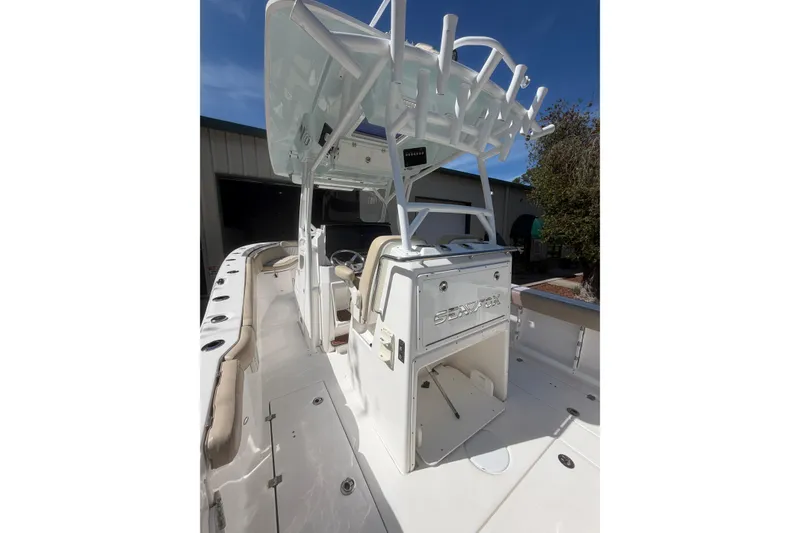 Slide: The Image of 2018 Seafox 288 Commander boat interior with seating and storage compartments. - 18