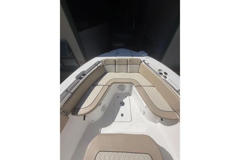 Slide: The Image of 2018 Seafox 288 Commander boat interior with beige cushioned seating. - 25