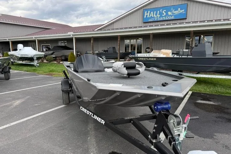 The Image of 2026 Crestliner 1600 Storm boat on trailer at Hall's Marine dealership. - 1