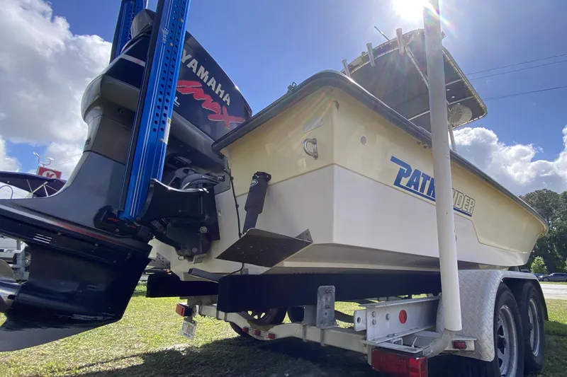 Slide: The Image of 1999 Pathfinder 2200 Tournament Edition boat with Yamaha engine on trailer. - 13
