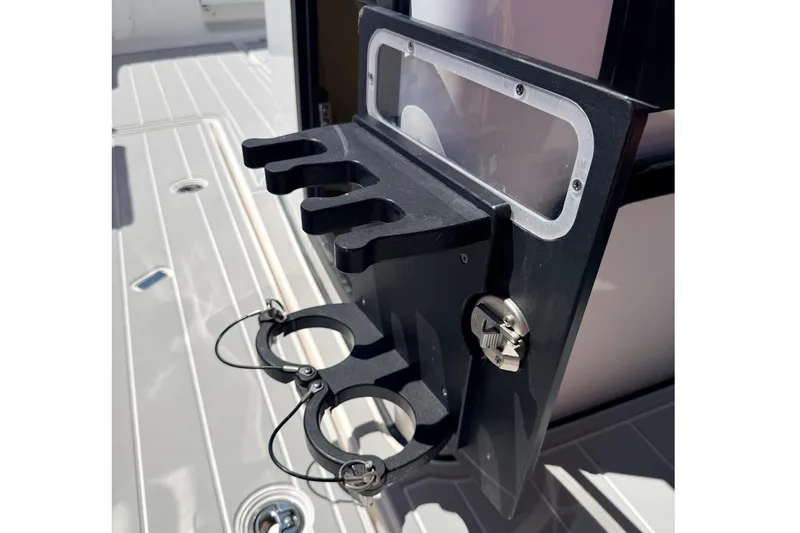 Slide: The Image of 2024 Tidewater 320 CC Adventure boat accessory holder on deck. - 21