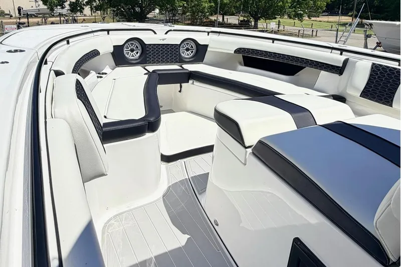 Slide: The Image of 2024 Tidewater 320 CC Adventure boat interior with sleek seating and modern design. - 28