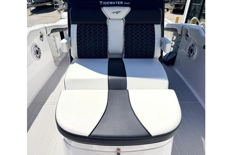 Slide: The Image of 2024 Tidewater 320 CC Adventure boat interior with sleek seating and modern design. - 29