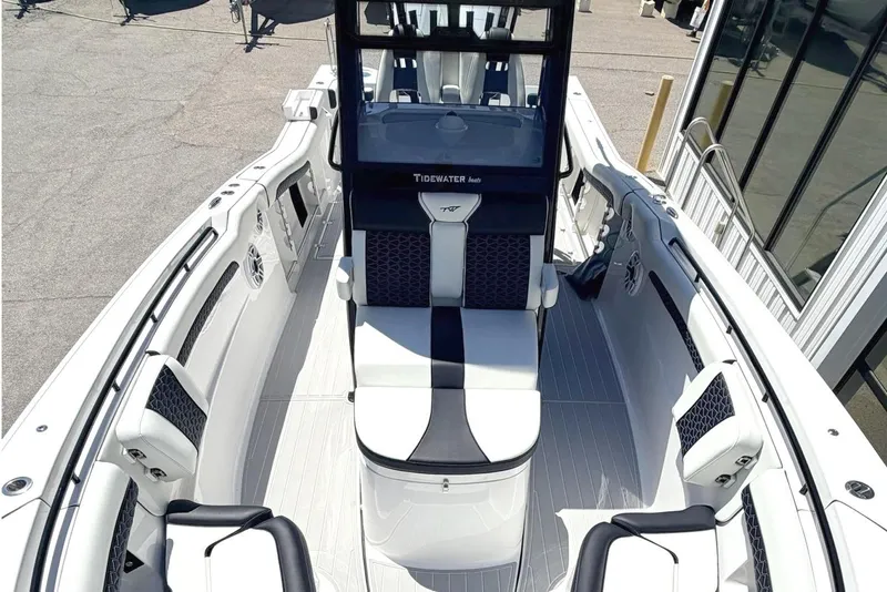 Slide: The Image of 2024 Tidewater 320 CC Adventure boat interior with sleek seating and modern design. - 31