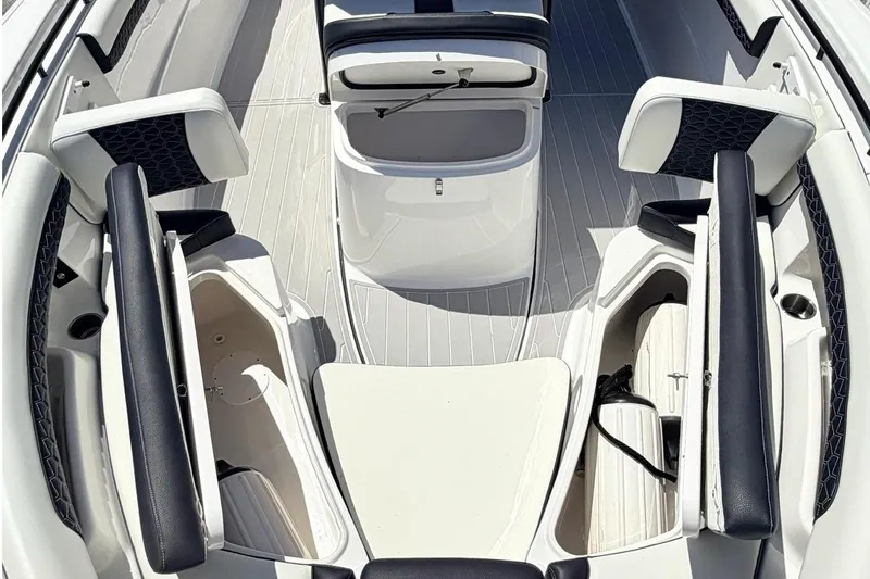 Slide: The Image of 2024 Tidewater 320 CC Adventure boat interior with sleek seating and modern design. - 32