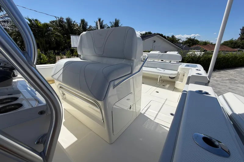 Slide: The Image of 2021 SeaVee 322Z boat interior with white seating and sleek design. - 19