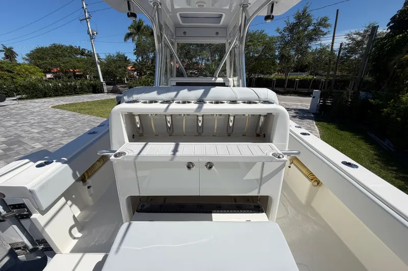 Slide: The Image of 2021 SeaVee 322Z boat interior with rod holders and storage compartments. - 6