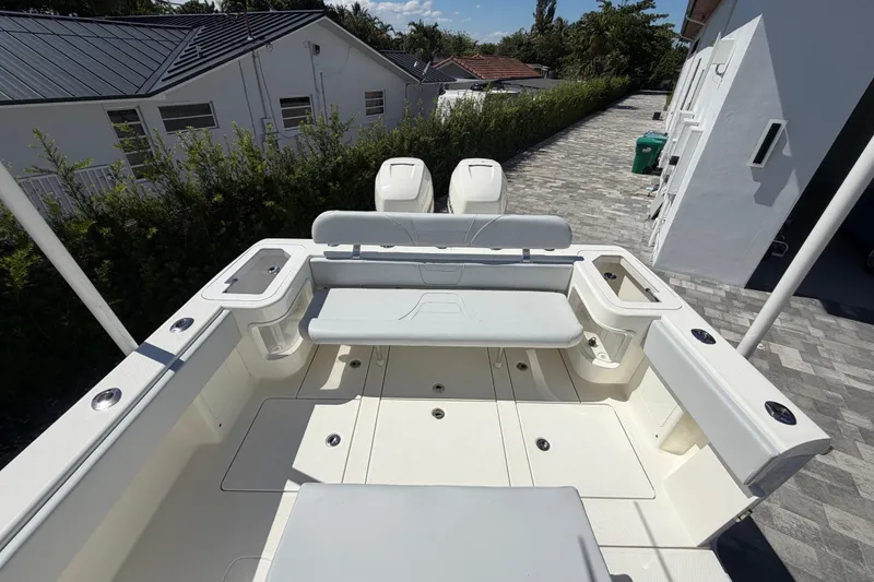 Slide: The Image of 2021 SeaVee 322Z boat deck with seating and storage compartments. - 8