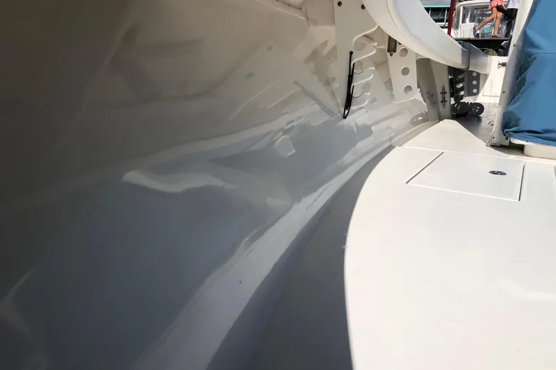 Slide: The Image of Interior view of a 2009 Contender 33 Tournament boat, showcasing sleek design. - 5