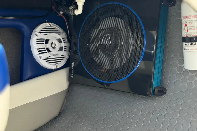 Slide: The Image of 2006 Bayliner 195 Bowrider interior with Kenwood speaker and Rockville subwoofer. - 18