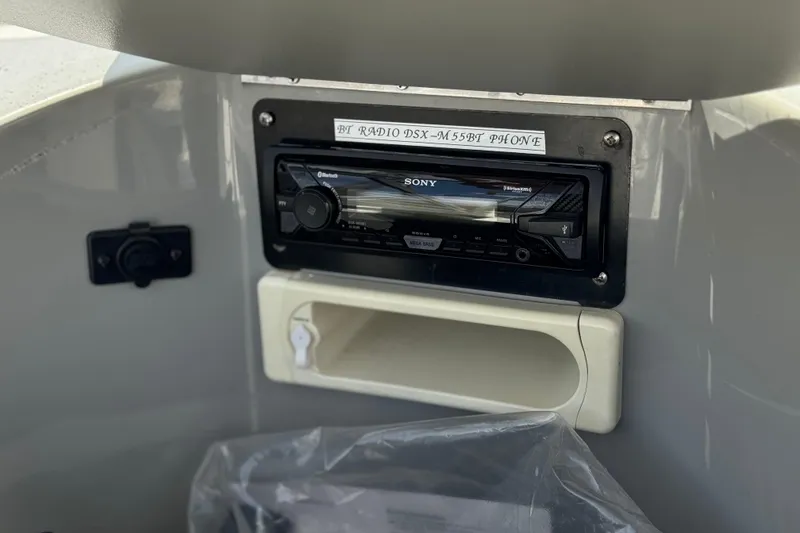 Slide: The Image of Sony radio installed in a 2006 Bayliner 195 Bowrider boat dashboard. - 19