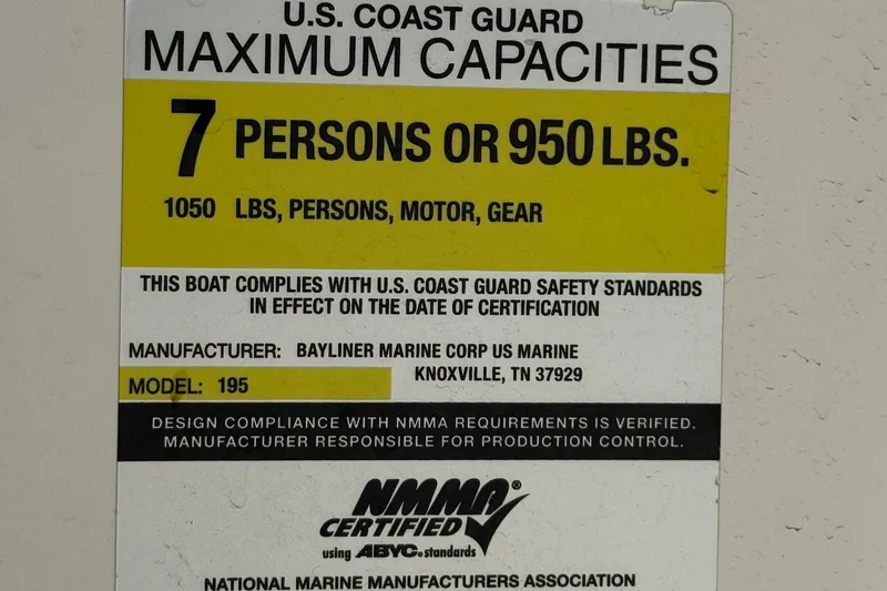 Slide: The Image of Capacity label for 2006 Bayliner 195 Bowrider, max 7 persons or 950 lbs. - 28