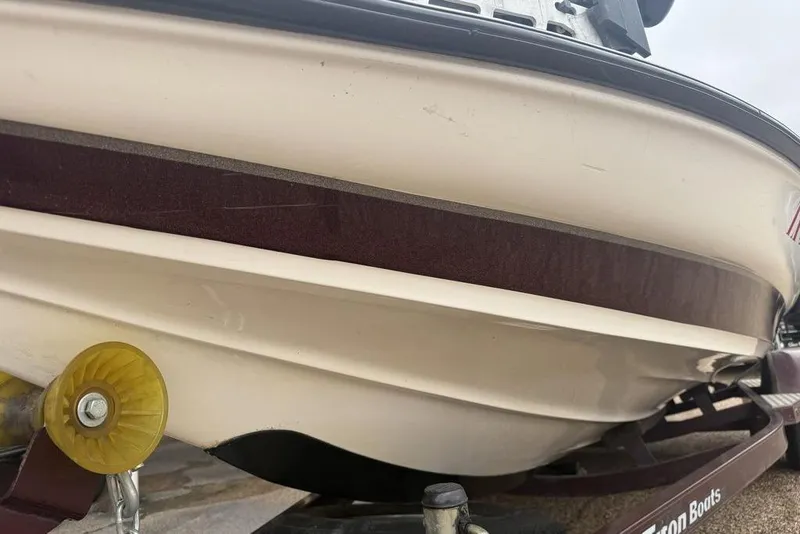 Slide: The Image of 2005 Triton TR-196 boat hull on trailer, close-up view. - 10