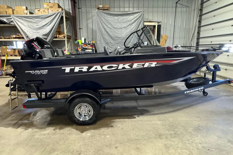 The Image of 2026 Tracker Pro Guide V-175 Combo boat in a garage setting. - 0