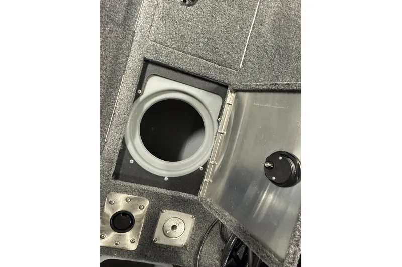 Slide: The Image of Open storage compartment in 2026 Tracker Pro Guide V-175 Combo boat. - 13