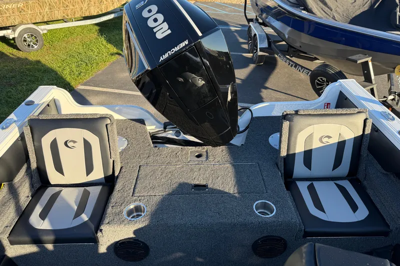 Slide: The Image of 2026 Crestliner 1850 Super Hawk boat interior with Mercury engine and seating. - 20