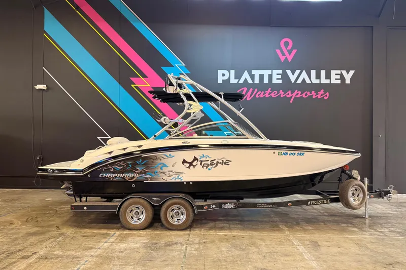 The Image of 2009 Chaparral Sunesta 224 Xtreme boat on trailer at Platte Valley Watersports showroom. - 1