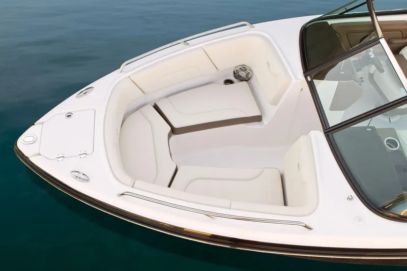 Slide: The Image of Manufacturer Provided Image: 2017 Chaparral 227 SSX boat bow seating area with white upholstery. - 11