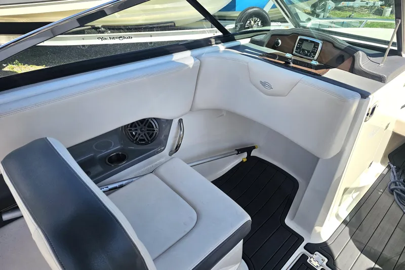Slide: The Image of Interior of 2017 Chaparral 227 SSX boat with seating and dashboard view. - 18
