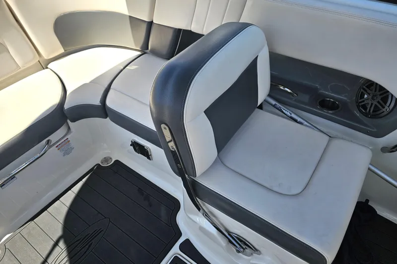 Slide: The Image of 2017 Chaparral 227 SSX boat interior seating with black and white upholstery. - 22