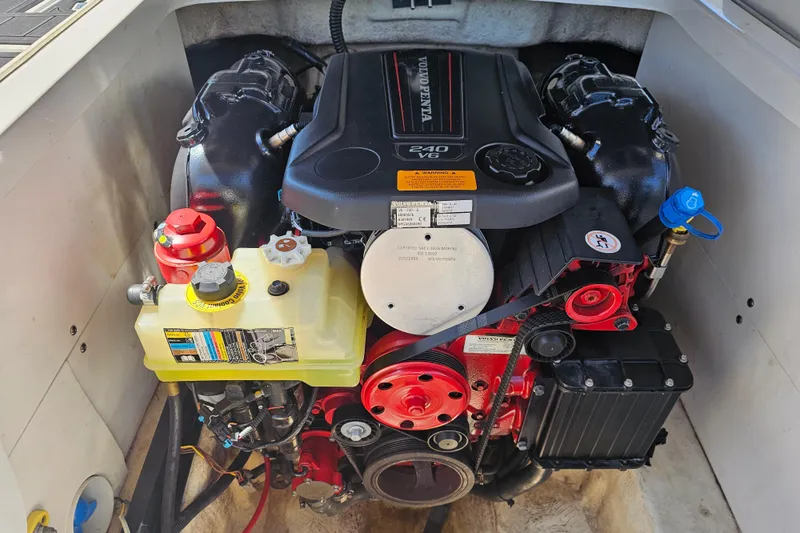 Slide: The Image of Engine compartment of a 2017 Chaparral 227 SSX boat with Volvo Penta 240 V6 engine. - 27